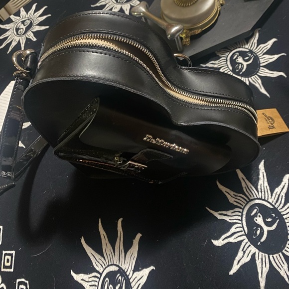 Heart shaped bag/back pack. It’s really sturdy and brand new. - Picture 5 of 6